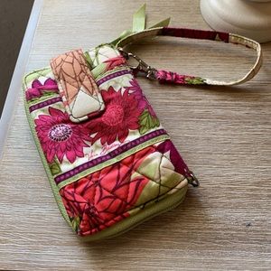 Sage green multi color Vera Bradley wristlet.